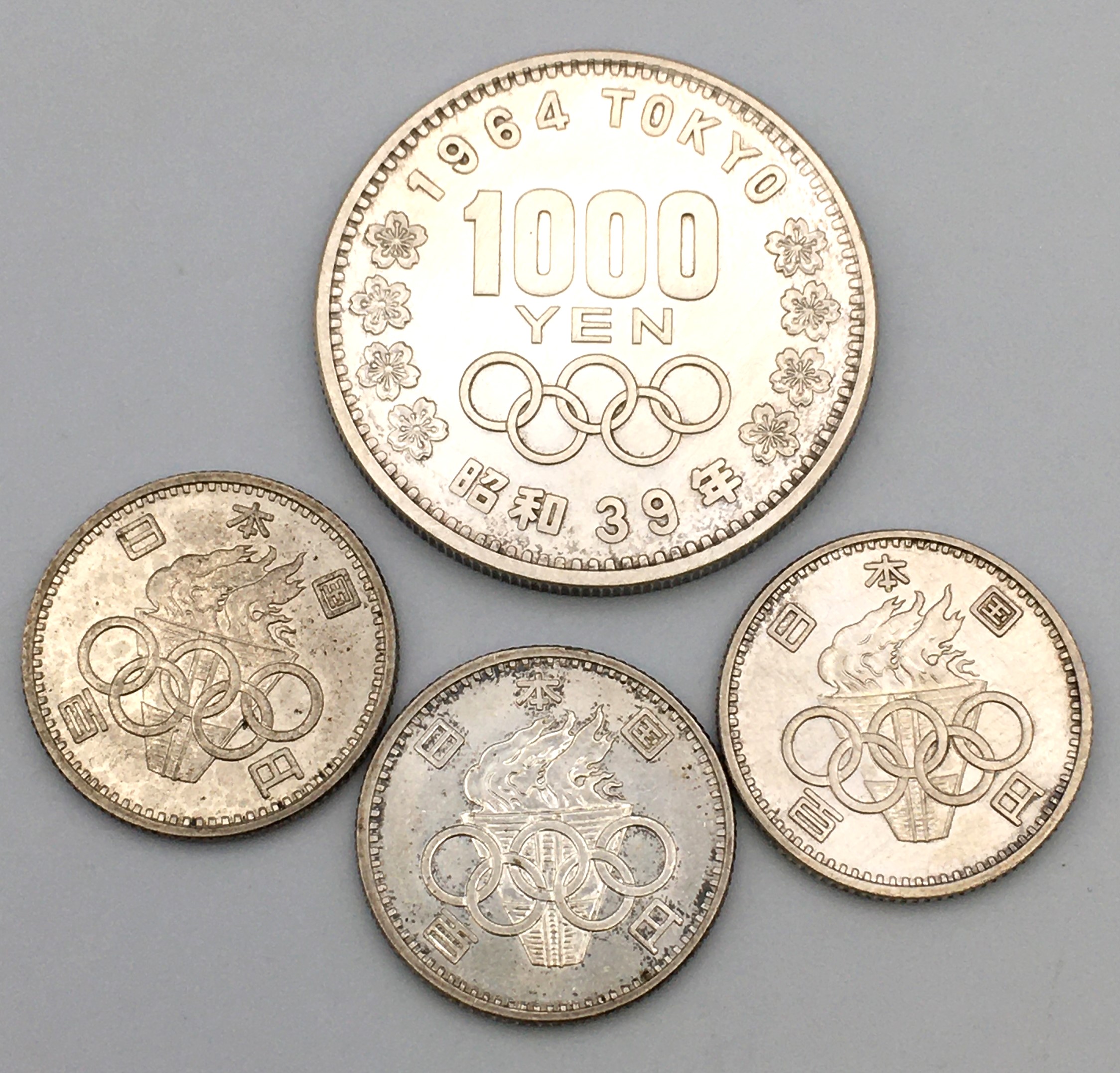オリンピック1000円銀貨・100円銀貨をお買取り致しました✨